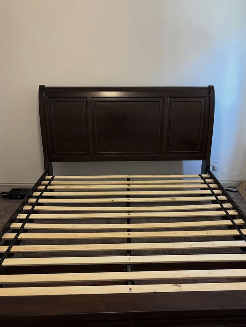 Queen sleigh bed frame fully built with every slat seated and secured
